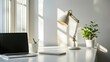 © CHALY GENTivE - Minimalist Workspace with Laptop, Notebook, and Desk Lamp for Focused Work in Bright Natural Light Setting