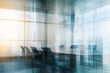 © Linas - Glass-Enclosed Conference Room with Blurred Cityscape and Minimalist Design