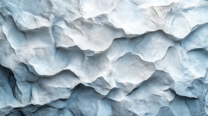 Wall Mural - A wall made of rocks with a blue and white color scheme