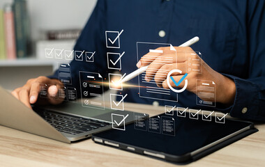 Canvas Print - business performance monitoring and evaluation concept, take an assessment, business man using lapto