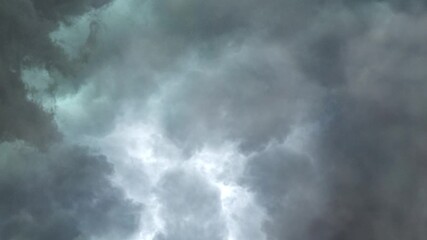 Wall Mural - supercell thunderstorm in dramatic dark clouds.