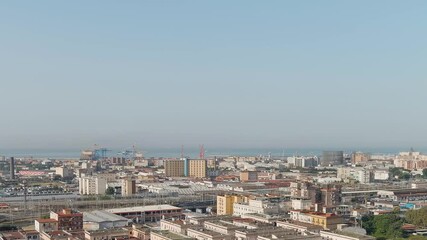 Sticker - Dolly zoom. Naples, Italy. Panorama of the city overlooking the port and the railway station. Daytime, Aerial View