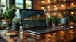 © Nuntapuk - laptop in the restaurant A workspace with a digital SEO graph and modern lighting