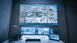 © Framestock - Surveillance video footage from the security cameras in office displayed on computer monitors, tablet display and big digital screen in dark modern monitoring center. Workplace for CCTV operator.