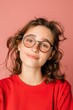 ©  Designer Kim - Portrait Of A Young Woman Showing Emotions, Wearing Glasses, Against A Pink Background