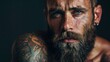 © Attasit - Bearded man with tattoos, his raw and real appearance celebrating cultural and personal diversity