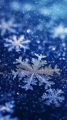 Canvas Print - Snowflake sparkling on blue background with falling snow