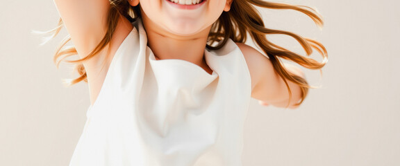 Wall Mural - Closeup of Little Girl's Smile in White Dress