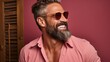 © Muhammad Anjum - confident Laughing expression natural face smile side away looking background isolated glasses wearing man hispanic Adult young boy indian male portrait excited yes success happy joy fashion cool
