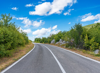 Wall Mural - Countryside highway in a beautiful mountainous area.