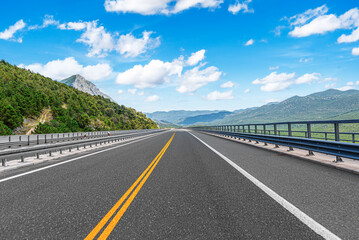 Wall Mural - Countryside highway in a beautiful mountainous area.