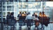 © Luminous Hub  - Group of business people having a meeting or brainstorming in a boardroom.