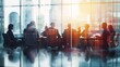 © Luminous Hub  - Group of business people having a meeting or brainstorming in a boardroom.