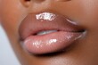 © Viam - Close-up of glossy natural lips