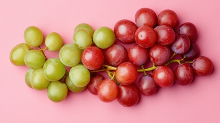 Wall Mural - Fresh green red grapes on pink background