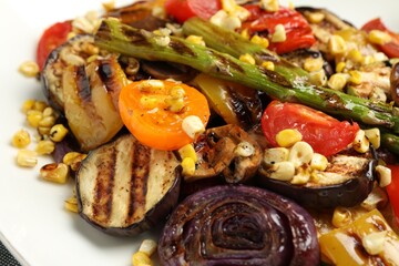 Wall Mural - Delicious salad with grilled vegetables on plate, closeup