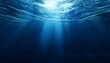 © Cynthia - Deep blue undersea with sunlight ray through over surface ripple wave background. Dark scene beneath blue sun beam. Abstract marine and aquatic. 3D illustration
