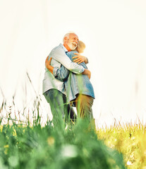 Wall Mural - woman man outdoor senior couple happy lifestyle retirement together smiling love hug nature mature