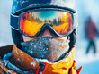 © alfa27 - A person wearing a ski helmet and goggles is standing in the snow