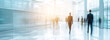 © fadi - Long exposure shot of crowd of business people walking in bright office lobby fast moving with blurry