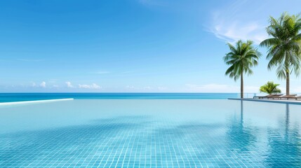 A beautiful blue pool with palm trees in the background