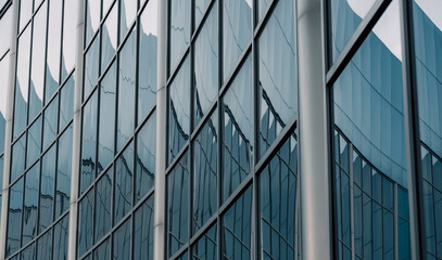 abstract background reflected in the glass windows of the building