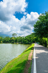 Wall Mural - a public place leisure travel landscape lake views at Ang Kaew Chiang Mai University and Doi Suthep nature forest Mountain views spring cloudy sky background with white cloud.