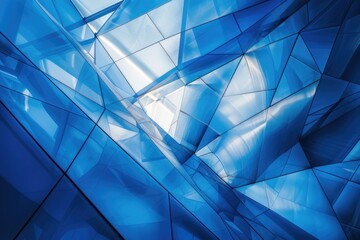 Poster - A clear blue glass structure with a blue sky in the background, suitable for use as an architectural or design concept image