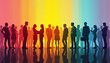 © umut hasanoglu - Silhouetted diverse group of people networking against a vibrant, multicolored background.