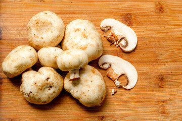 mushrooms on a wooden background