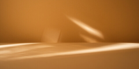 Wall Mural - Light background. Abstract sunlight reflections and shadow on brown wall.