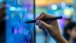 © AhmadTriwahyuutomo - Close-Up of a Teacher Using a Smart Board with a Digital Pen in a Classroom