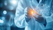 © Jirapron - A scientist in a white lab coat manipulating glowing particles, symbolizing innovation and advanced technology in research. Healthcare AI concept.