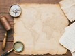 © Mont - Vintage map with compass and magnifying glass, evoking exploration and adventure in a rustic setting.