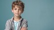 © Preecha - Ultra-sharp image of a boy in a casual outfit with a plain color background, clear and detailed