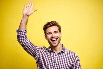 Happy Young Man Waving with a Big Smile.