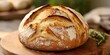 © MAN - Freshly Baked Crusty Bread on Wooden Board - Photo