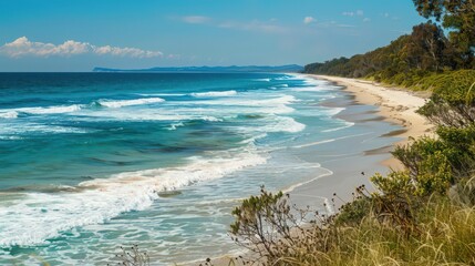 Wall Mural - The picturesque coastline includes serene sandy shores with gently breaking waves and vibrant coastal vegetation providing a peaceful retreat