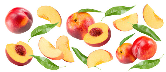 Wall Mural - flying cuts of peach fruit with green leaf isolated on white background. clipping path