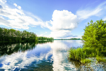 Landscape at the Feilenmoos local recreation area. Bathing lake between Manching and Geisenfeld. Nature at the quarry lake.
