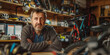 © lenblr - Worried mature male business owner standing with crossed arms in his bike shop, facing economic challenges and slow sales