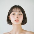 © Surachetsh - Young Asian woman with clean, fresh skin and short hair bobtail style, embodying beauty and cosmetic care concepts.