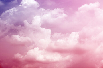 Wall Mural - sky with sugar cotton pink pastel clouds in a dreamy background