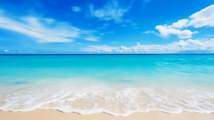 Clean turquoise sea with sand and bubbles on tropical beach under blue sky little white cloud on summer vacation holiday