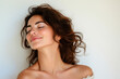 © MagnusCort - A close up of a woman's face with her eyes closed