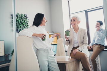 Sticker - Photo of business people in modern office relax with coffee cup