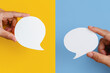 © Ratana21 - Conceptual image about communication and social media, customer feedback, hand hold blank couple real white speech bubble paper cut on yellow and blue color background