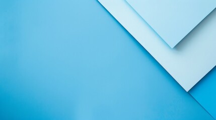 Poster - This image features a composition of overlapping light blue and dark blue sheets of paper placed on a matching blue background, creating a serene and minimal aesthetic.