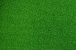 © Mariia - Artificial grass, covering. Artificial green grass mat, top view. Texture. Background. Artificial turf, surface made of synthetic fibers. Flat green grass texture background. Short grass