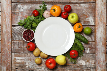 Wall Mural - Different vegetarian products on wooden table, top view